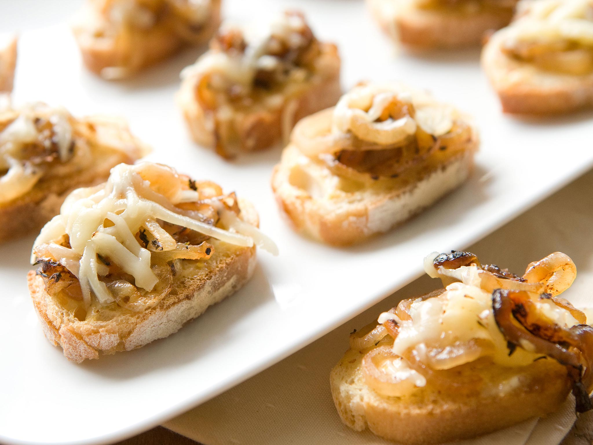 Recipe: <!-- -->Swiss Cheese Onion Crostini<!-- --> | Whole Foods Market
