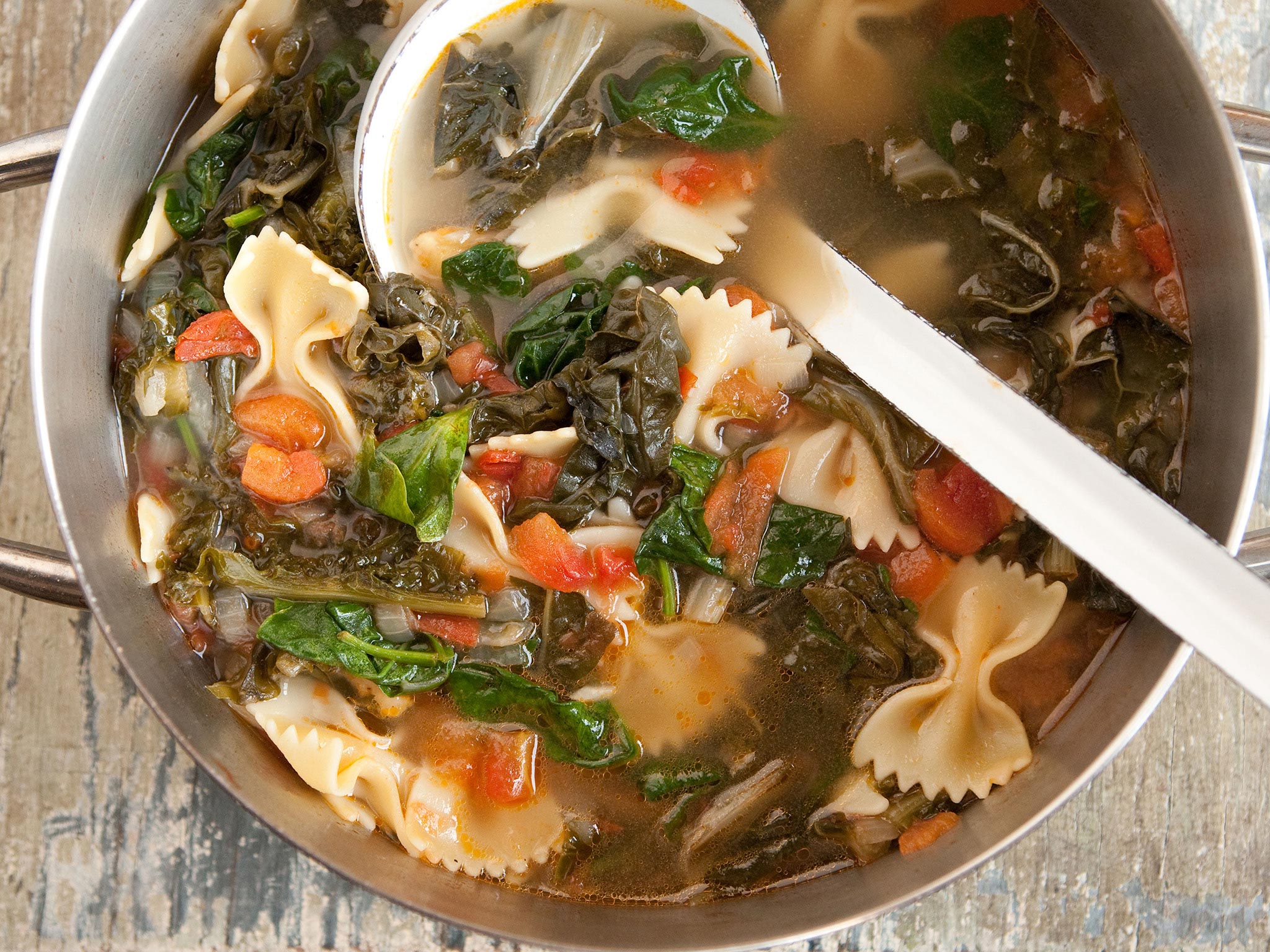 Recipe Hearty Greens Soup with Bowtie Pasta and Tomatoes Whole Foods