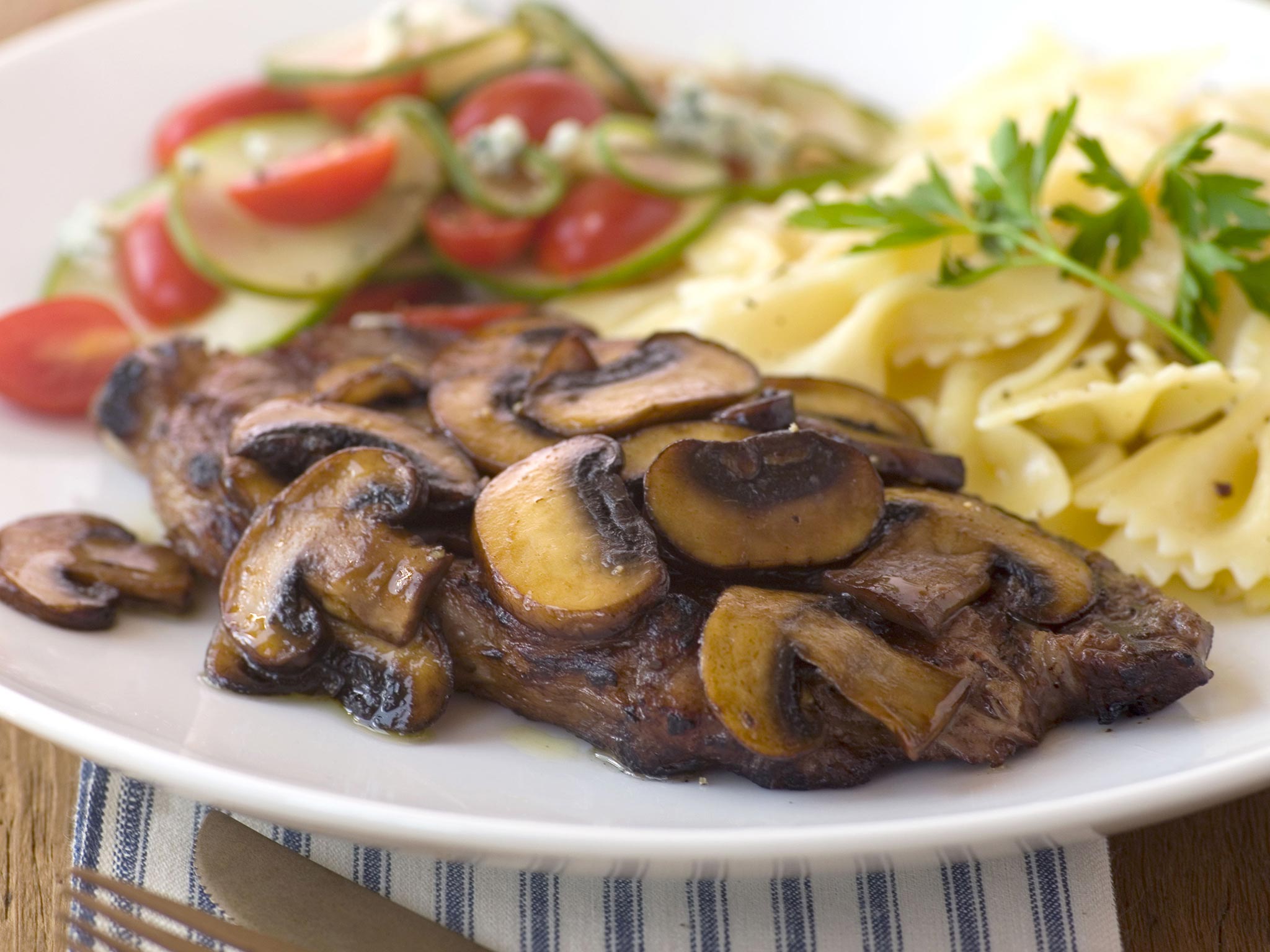 Recipe: <!-- -->New York Strip Steaks with Cucumber-Tomato Salad and Bow Tie Pasta<!-- --> | Whole F
